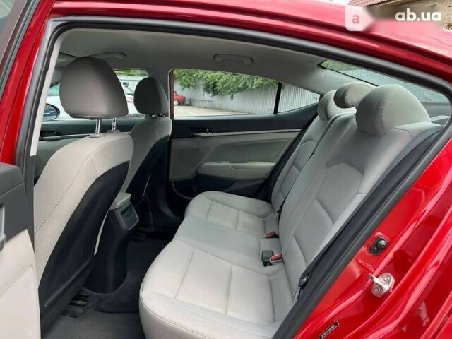 Красный Хендай Элантра, объемом двигателя 2 л и пробегом 67 тыс. км за 14000 $, фото 10 на Automoto.ua