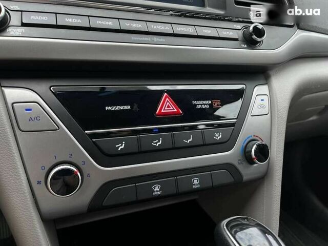 Красный Хендай Элантра, объемом двигателя 2 л и пробегом 67 тыс. км за 14000 $, фото 12 на Automoto.ua