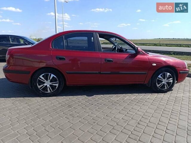 Красный Хендай Элантра, объемом двигателя 1.6 л и пробегом 265 тыс. км за 3000 $, фото 1 на Automoto.ua