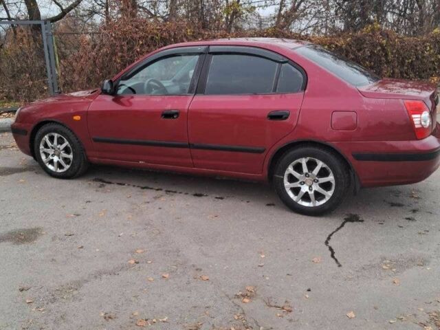 Красный Хендай Элантра, объемом двигателя 1.6 л и пробегом 200 тыс. км за 3200 $, фото 4 на Automoto.ua