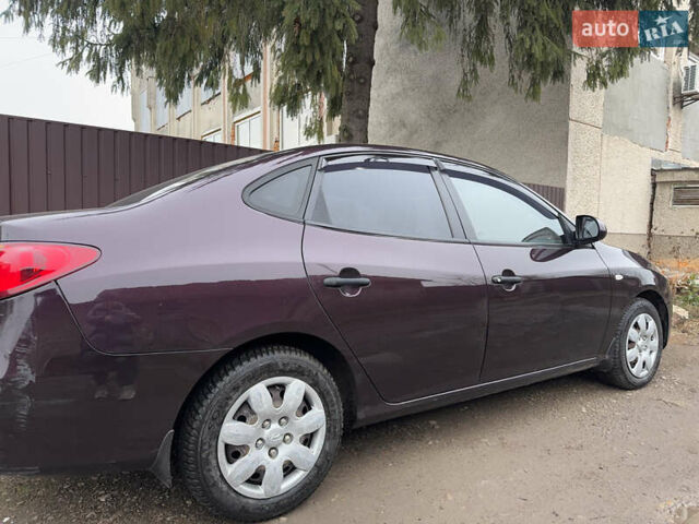 Червоний Хендай Елантра, об'ємом двигуна 1.6 л та пробігом 167 тис. км за 5999 $, фото 6 на Automoto.ua