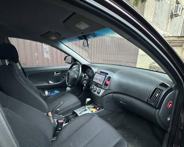 Червоний Хендай Елантра, об'ємом двигуна 1.6 л та пробігом 167 тис. км за 5999 $, фото 10 на Automoto.ua