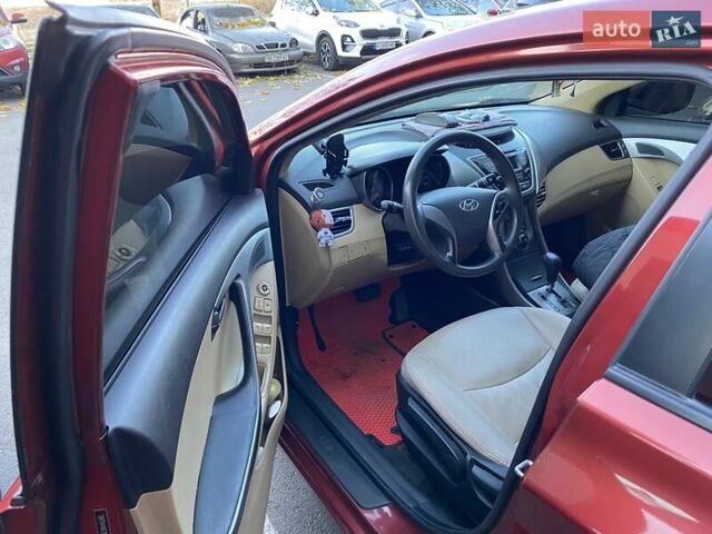 Красный Хендай Элантра, объемом двигателя 1.8 л и пробегом 277 тыс. км за 7500 $, фото 13 на Automoto.ua