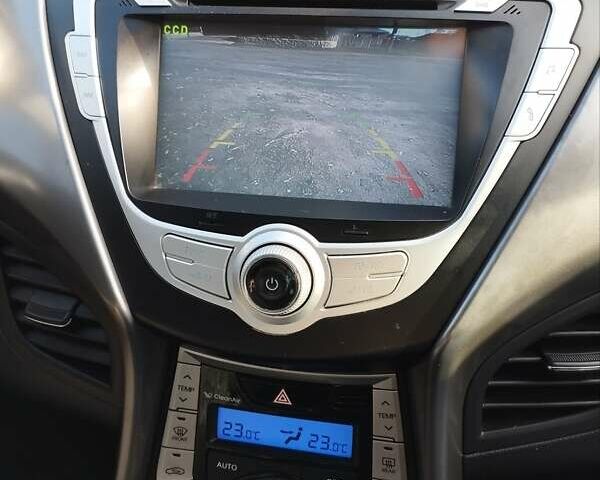 Красный Хендай Элантра, объемом двигателя 1.8 л и пробегом 195 тыс. км за 8500 $, фото 11 на Automoto.ua