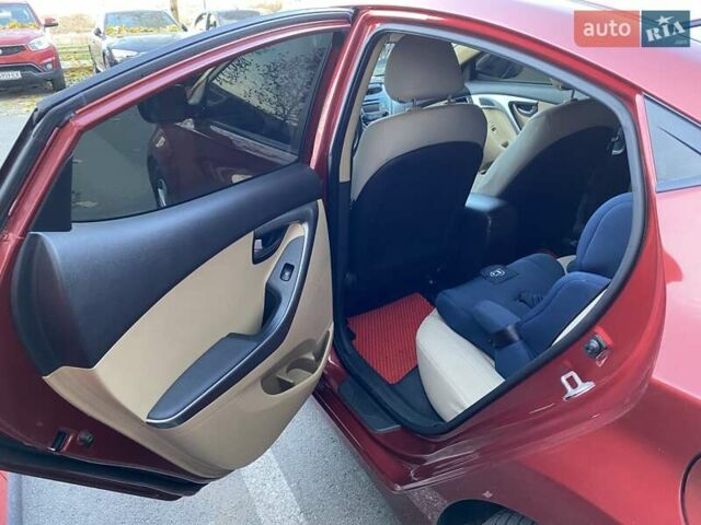 Красный Хендай Элантра, объемом двигателя 1.8 л и пробегом 277 тыс. км за 7500 $, фото 16 на Automoto.ua