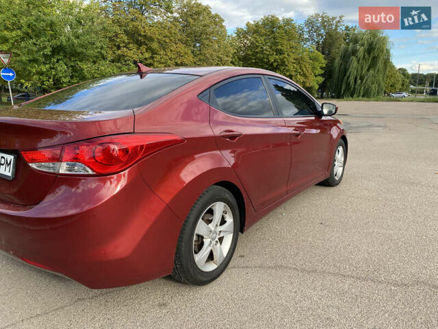 Красный Хендай Элантра, объемом двигателя 1.8 л и пробегом 336 тыс. км за 8350 $, фото 1 на Automoto.ua