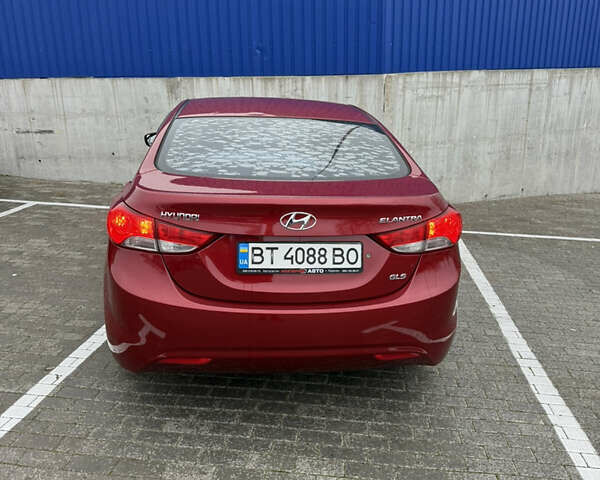 Красный Хендай Элантра, объемом двигателя 1.59 л и пробегом 136 тыс. км за 9800 $, фото 5 на Automoto.ua