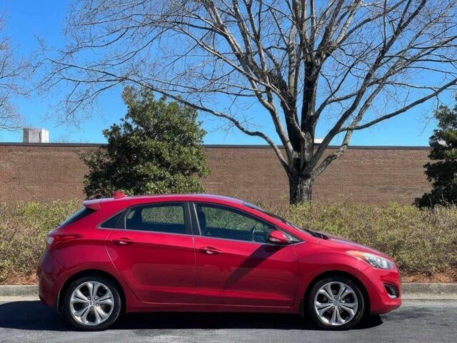 Красный Хендай Элантра, объемом двигателя 2 л и пробегом 88 тыс. км за 13550 $, фото 2 на Automoto.ua