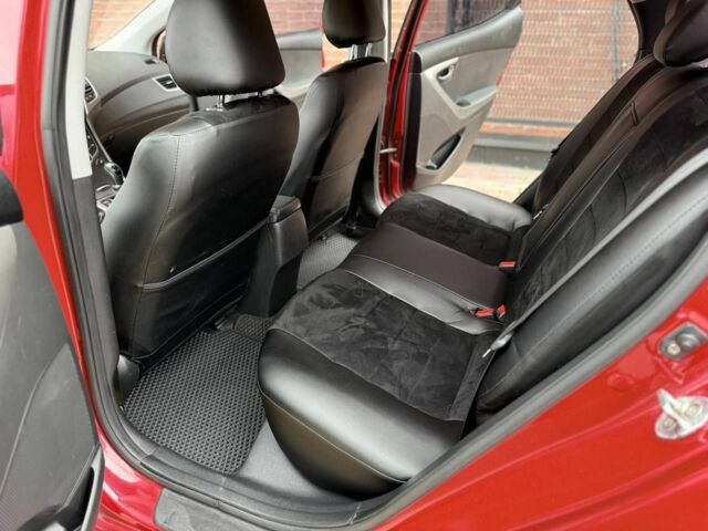 Красный Хендай Элантра, объемом двигателя 1.6 л и пробегом 190 тыс. км за 9700 $, фото 13 на Automoto.ua