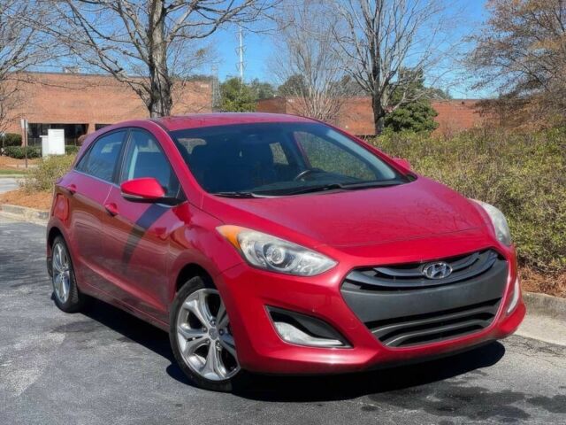Красный Хендай Элантра, объемом двигателя 2 л и пробегом 88 тыс. км за 13550 $, фото 1 на Automoto.ua