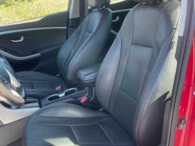 Красный Хендай Элантра, объемом двигателя 2 л и пробегом 88 тыс. км за 13550 $, фото 7 на Automoto.ua