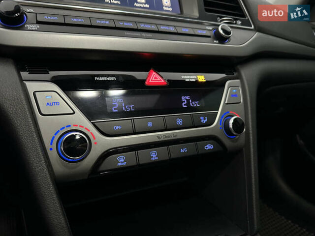 Красный Хендай Элантра, объемом двигателя 2 л и пробегом 85 тыс. км за 12000 $, фото 16 на Automoto.ua