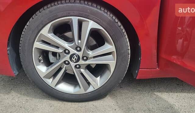 Красный Хендай Элантра, объемом двигателя 2 л и пробегом 69 тыс. км за 12000 $, фото 17 на Automoto.ua