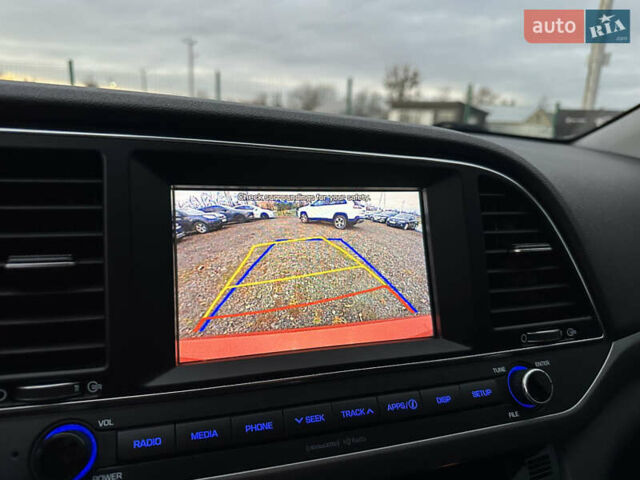 Красный Хендай Элантра, объемом двигателя 2 л и пробегом 85 тыс. км за 12000 $, фото 15 на Automoto.ua