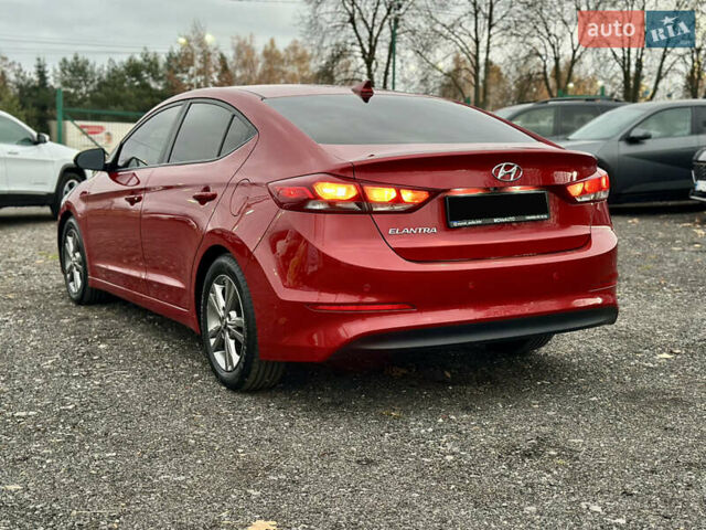 Красный Хендай Элантра, объемом двигателя 2 л и пробегом 85 тыс. км за 12000 $, фото 6 на Automoto.ua