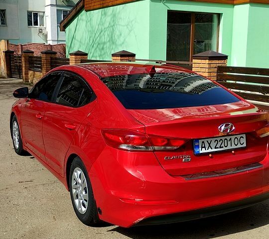 Красный Хендай Элантра, объемом двигателя 2 л и пробегом 80 тыс. км за 9600 $, фото 5 на Automoto.ua