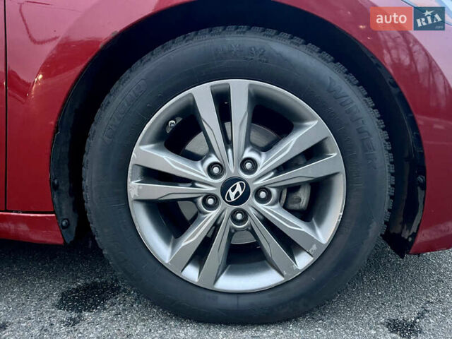 Красный Хендай Элантра, объемом двигателя 2 л и пробегом 182 тыс. км за 11500 $, фото 13 на Automoto.ua