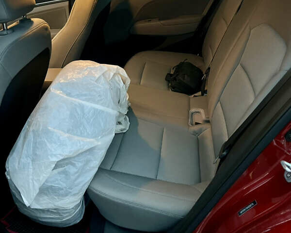 Красный Хендай Элантра, объемом двигателя 2 л и пробегом 182 тыс. км за 11500 $, фото 16 на Automoto.ua