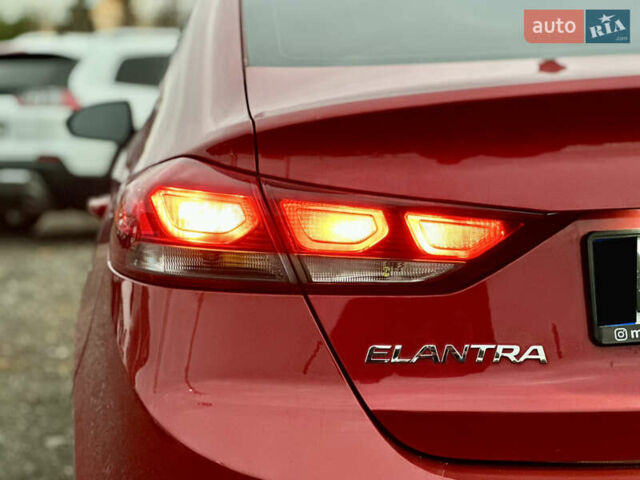Красный Хендай Элантра, объемом двигателя 2 л и пробегом 85 тыс. км за 12000 $, фото 5 на Automoto.ua