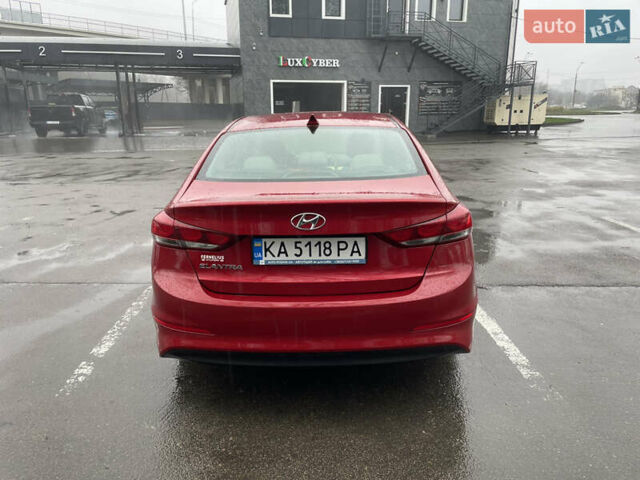 Красный Хендай Элантра, объемом двигателя 2 л и пробегом 132 тыс. км за 10250 $, фото 5 на Automoto.ua