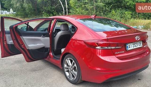 Красный Хендай Элантра, объемом двигателя 2 л и пробегом 69 тыс. км за 12000 $, фото 5 на Automoto.ua