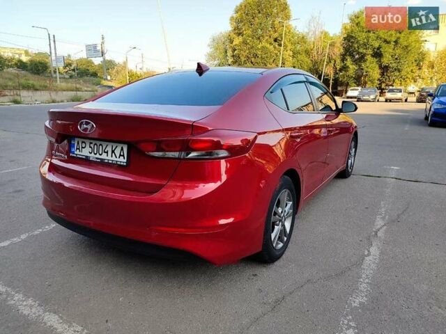 Красный Хендай Элантра, объемом двигателя 2 л и пробегом 112 тыс. км за 12600 $, фото 7 на Automoto.ua