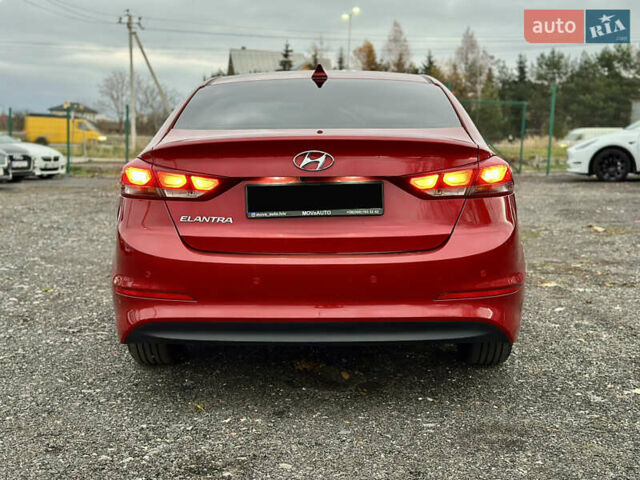 Красный Хендай Элантра, объемом двигателя 2 л и пробегом 85 тыс. км за 12000 $, фото 4 на Automoto.ua