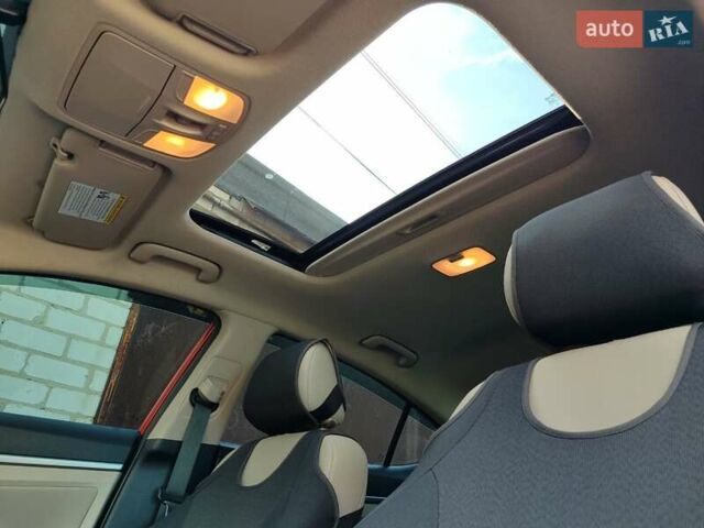 Красный Хендай Элантра, объемом двигателя 2 л и пробегом 112 тыс. км за 12600 $, фото 14 на Automoto.ua