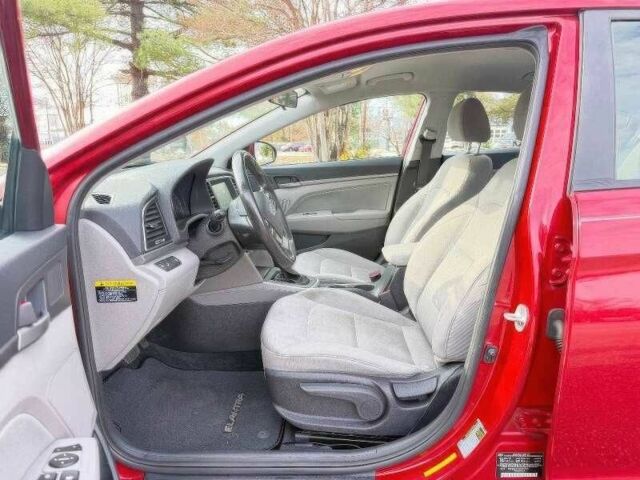 Красный Хендай Элантра, объемом двигателя 2 л и пробегом 99 тыс. км за 5900 $, фото 7 на Automoto.ua