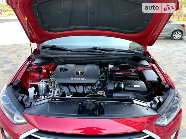 Красный Хендай Элантра, объемом двигателя 2 л и пробегом 74 тыс. км за 11800 $, фото 25 на Automoto.ua