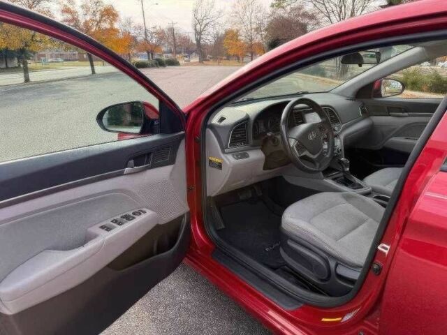 Красный Хендай Элантра, объемом двигателя 2 л и пробегом 99 тыс. км за 5900 $, фото 6 на Automoto.ua