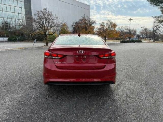 Красный Хендай Элантра, объемом двигателя 2 л и пробегом 99 тыс. км за 5900 $, фото 3 на Automoto.ua