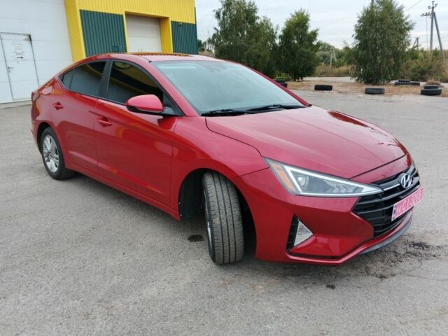 Красный Хендай Элантра, объемом двигателя 2 л и пробегом 75 тыс. км за 13900 $, фото 3 на Automoto.ua