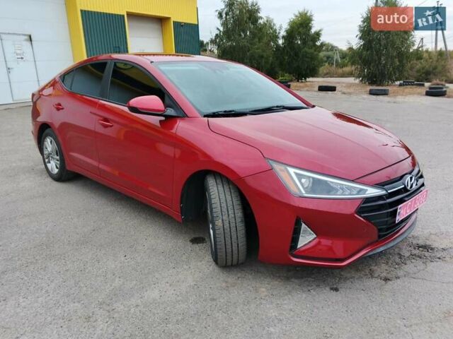 Красный Хендай Элантра, объемом двигателя 2 л и пробегом 75 тыс. км за 13900 $, фото 4 на Automoto.ua