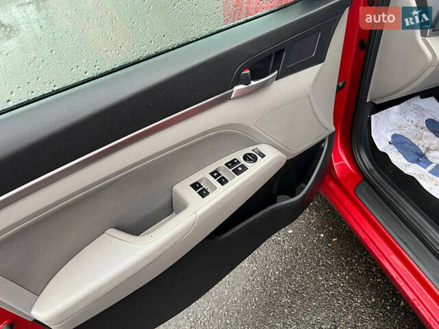 Красный Хендай Элантра, объемом двигателя 2 л и пробегом 147 тыс. км за 13300 $, фото 6 на Automoto.ua