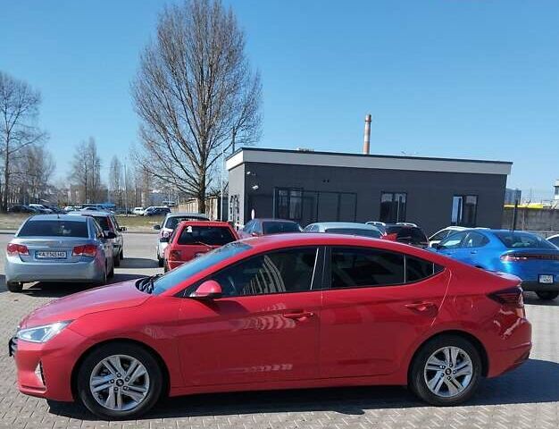 Красный Хендай Элантра, объемом двигателя 2 л и пробегом 60 тыс. км за 13600 $, фото 7 на Automoto.ua