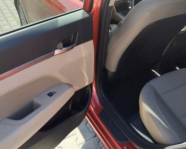 Красный Хендай Элантра, объемом двигателя 2 л и пробегом 60 тыс. км за 13600 $, фото 19 на Automoto.ua