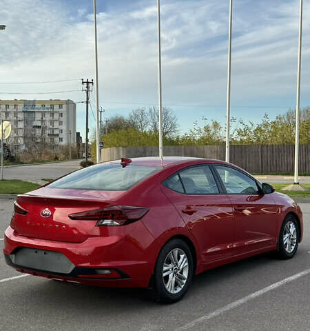 Красный Хендай Элантра, объемом двигателя 2 л и пробегом 40 тыс. км за 13200 $, фото 7 на Automoto.ua