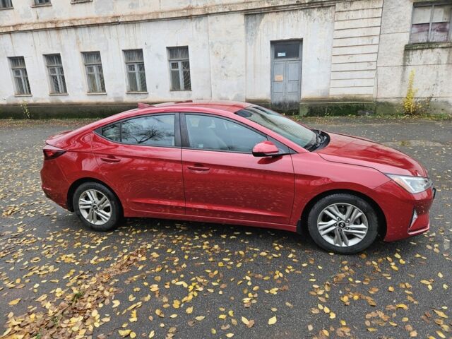 Красный Хендай Элантра, объемом двигателя 2 л и пробегом 71 тыс. км за 14600 $, фото 5 на Automoto.ua