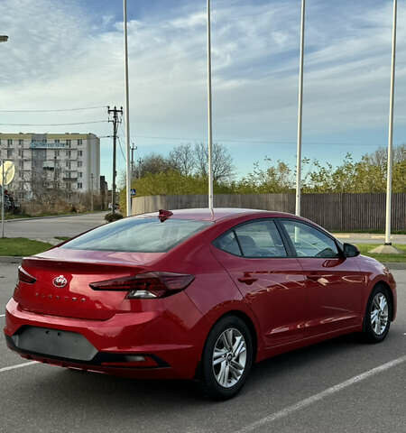 Красный Хендай Элантра, объемом двигателя 2 л и пробегом 40 тыс. км за 13200 $, фото 6 на Automoto.ua