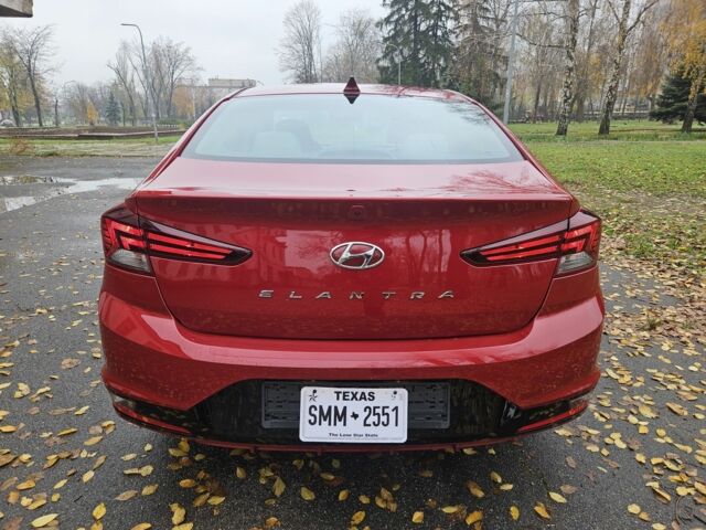 Красный Хендай Элантра, объемом двигателя 2 л и пробегом 71 тыс. км за 14600 $, фото 8 на Automoto.ua