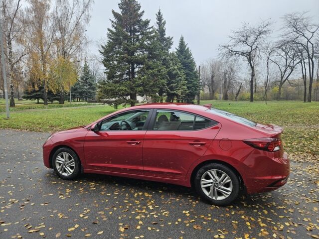 Красный Хендай Элантра, объемом двигателя 2 л и пробегом 71 тыс. км за 14600 $, фото 10 на Automoto.ua