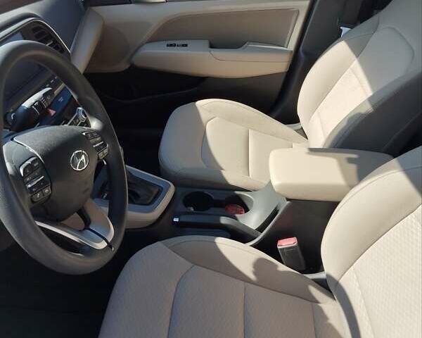 Красный Хендай Элантра, объемом двигателя 2 л и пробегом 60 тыс. км за 13600 $, фото 12 на Automoto.ua