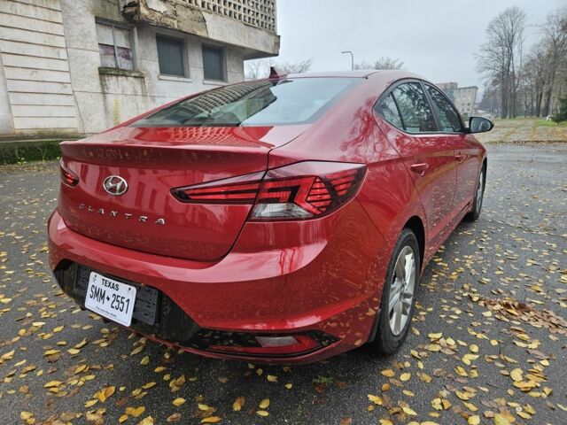Красный Хендай Элантра, объемом двигателя 2 л и пробегом 71 тыс. км за 14600 $, фото 7 на Automoto.ua