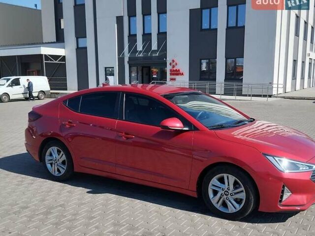 Красный Хендай Элантра, объемом двигателя 2 л и пробегом 60 тыс. км за 13600 $, фото 6 на Automoto.ua