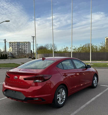 Красный Хендай Элантра, объемом двигателя 2 л и пробегом 40 тыс. км за 13200 $, фото 9 на Automoto.ua