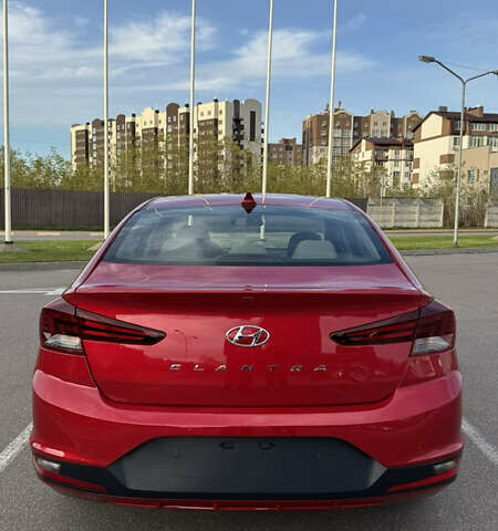 Красный Хендай Элантра, объемом двигателя 2 л и пробегом 40 тыс. км за 13200 $, фото 8 на Automoto.ua
