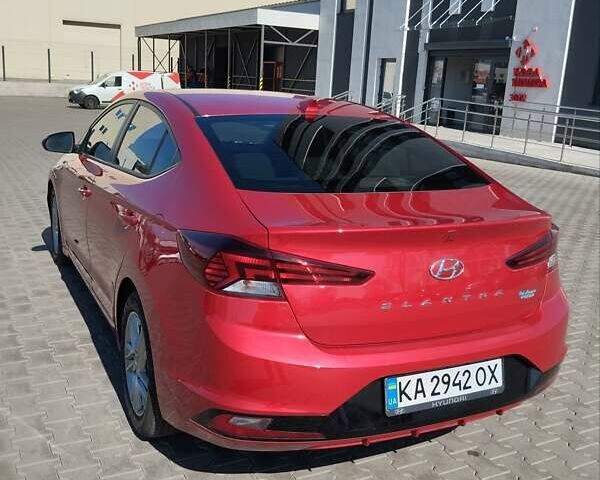 Красный Хендай Элантра, объемом двигателя 2 л и пробегом 60 тыс. км за 13600 $, фото 4 на Automoto.ua