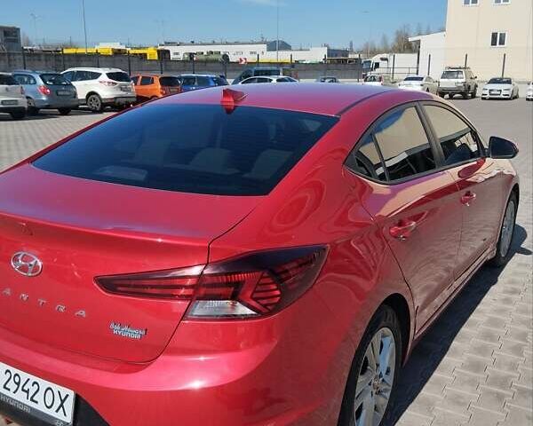 Красный Хендай Элантра, объемом двигателя 2 л и пробегом 60 тыс. км за 13600 $, фото 5 на Automoto.ua