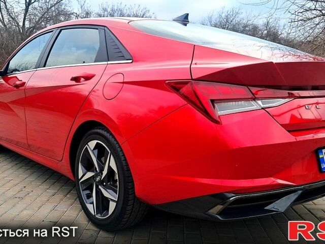 Красный Хендай Элантра, объемом двигателя 2 л и пробегом 77 тыс. км за 19300 $, фото 2 на Automoto.ua